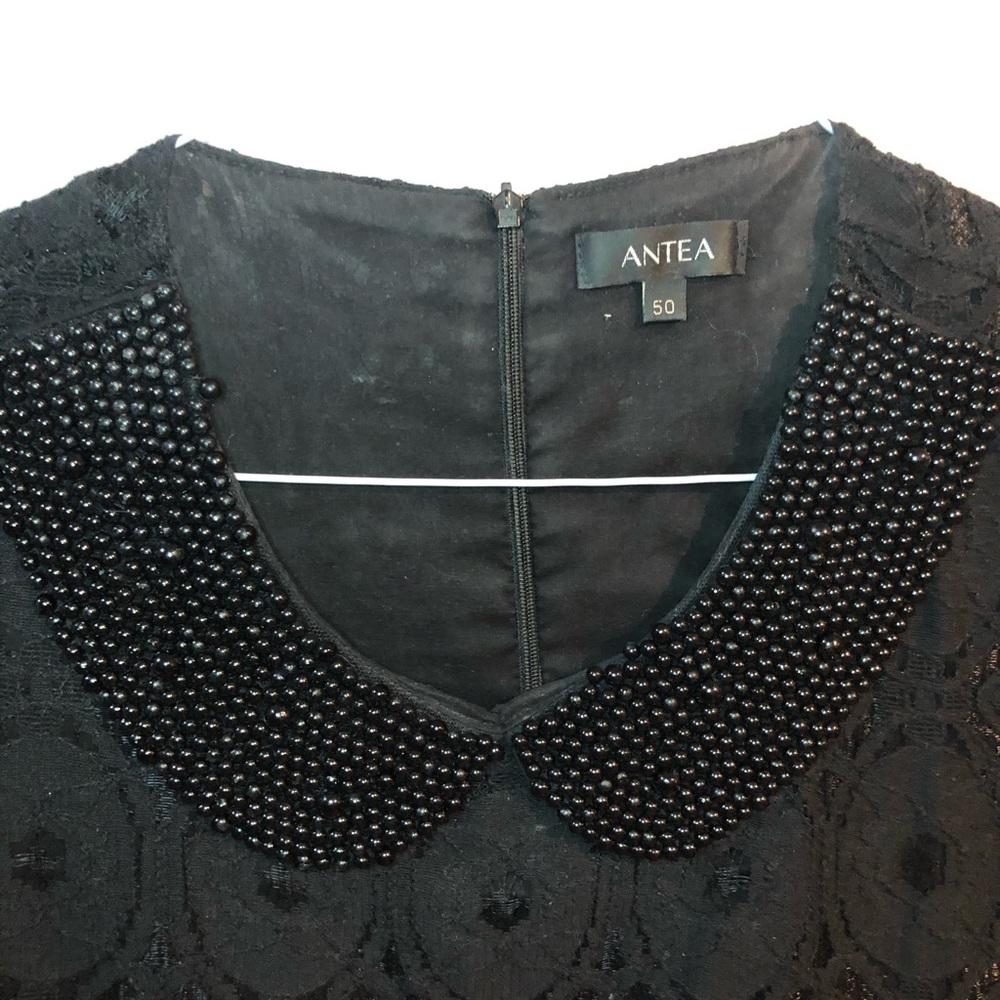 Lace dress with beaded collar